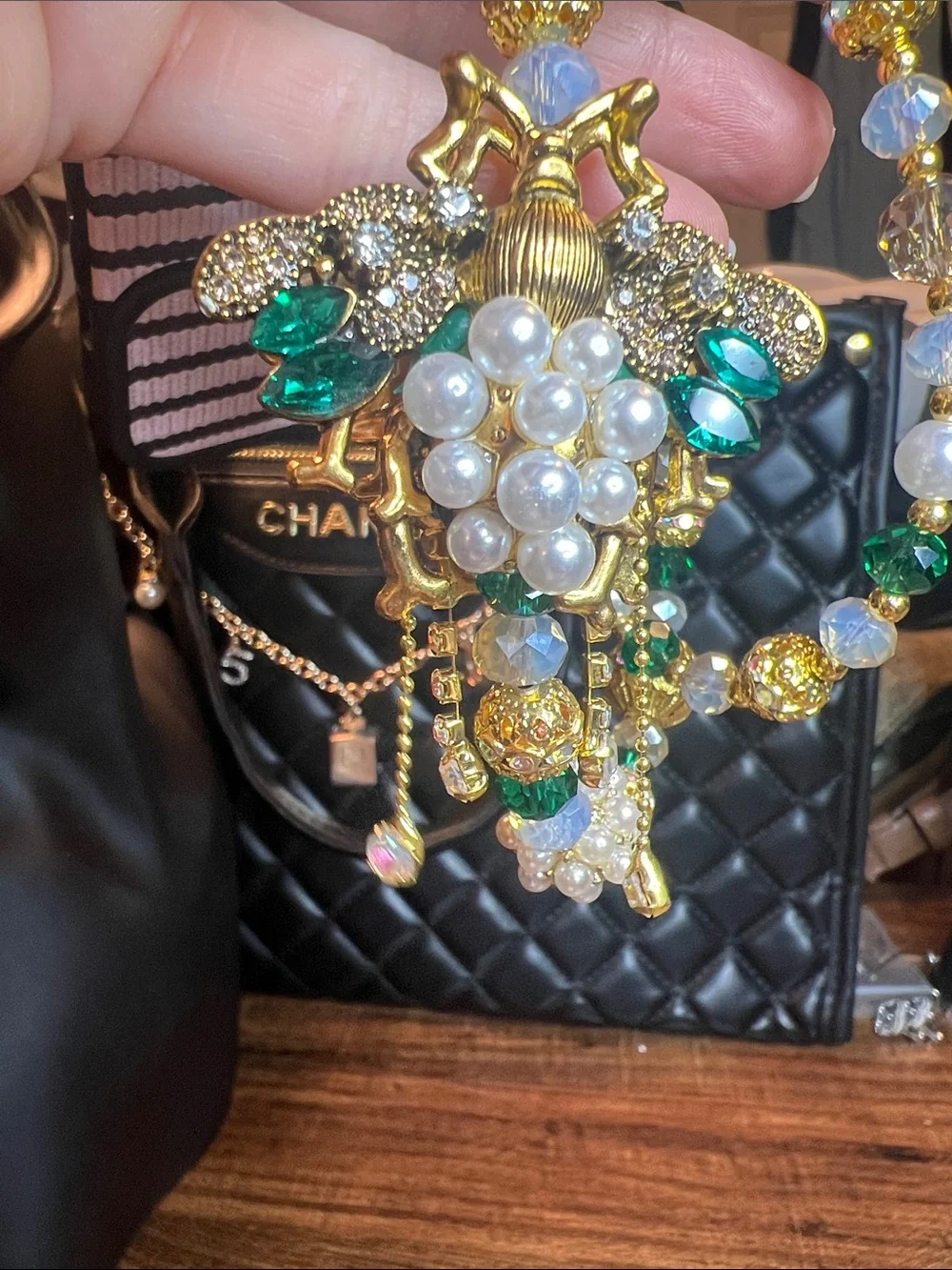 Phone Wristlet with Decorative Beaded Pearl Bee and Multicolored Strap